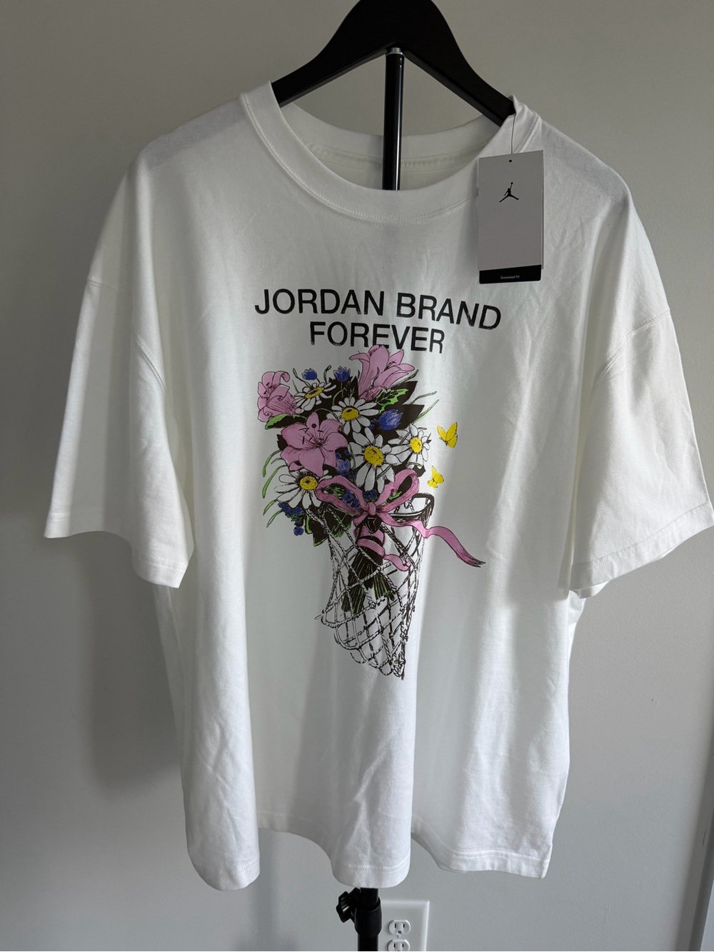 Jordan White Graphic Tee with Pink Floral Accent